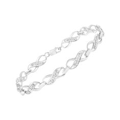 Treat yourself to this elegant and refined infinity link bracelet. Created in cool .925 sterling silver, this piece is designed with silver infinity links with a streak in the middle of round-cut diamonds. This prong set, diamond accent piece is 7.25 inches in length and will be the perfect addition to your jewelry collection. Design Silver, High Quality Jewelry, Diamond Gemstone, Bracelet Sizes, Free Jewelry, Sterling Silver Bracelets, Link Bracelets, Amazing Jewelry, Prong Setting