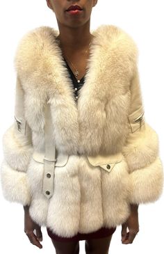 Natural cross fox fur and leather jacket. Double clip closure. Available in sizes small, medium, and large. Luxury Fur Coat With Feather Trim For Winter, Luxury Winter Fur Coat With Feather Trim, Luxury Sheepskin Fur Coat With Faux Fur Lining, Luxury Faux Fur Coat With Faux Fur Trim, Luxury Faux Fur Winter White Outerwear, Luxury Faux Fur Outerwear, White Luxury Faux Fur Coat, Luxury White Faux Fur Coat, Luxury Sheepskin Fur Coat With Faux Fur Trim