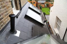 an outdoor hot tub on the roof of a house