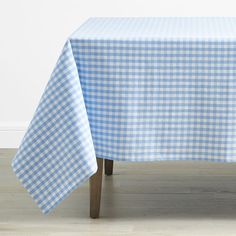 a blue and white checkered table cloth