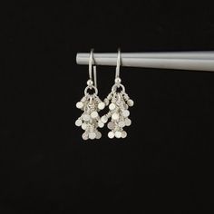 This extremely sweet and unique pair of Silver Tassel Dangle Earrings are handcrafted for you with great care. The earrings are handmade and hammered from fine 925 Sterling Silver or 14K Gold Filled. They are lightweight and dainty, perfect for everyday wear!  MATERIALS AND SIZE  ◆ Metal - 925 Sterling Silver, 14K Gold Filled ◆ Earrings measure approx. 26 mm / 1.02 inches from the top of the ear wire ◆ All earrings with French ear wires come with silicone ear backs for extra protection LINK TO T Long Drop Chandelier Earrings With Dangling Beads For Gift, Handmade Silver Drop Cluster Earrings, Silver Long Drop Tassel Earrings As Gift, Silver Long Drop Tassel Earrings For Gift, Silver Dangle Cluster Earrings As Gift, Minimalist Dangle Tassel Earrings For Gift, Minimalist Dangle Tassel Earrings As Gift, Delicate Long Drop Earrings With Dangling Beads, Silver Tassel Earrings With Dangling Beads For Gift