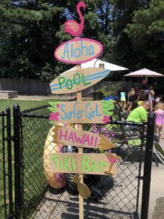 a sign that says aloha pool surf girl hawaii tiki bar