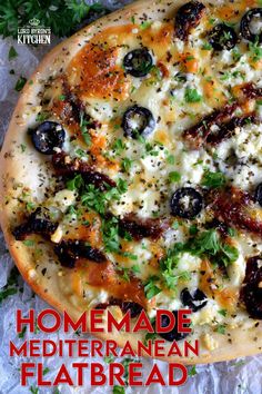 homemade mediterranean flatbread pizza with olives and parsley