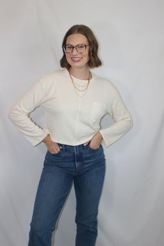 Everyday and simple cream ribbed knit top with long sleeves, cropped fit, and front pocket details details & fit: fits true to size. 64% cotton, 30% polyester, 6% spandex measurements: small: bust 36"/ waist 36"/ length 17.5" medium: bust 38"/ waist 38"/ length 18" large: bust 40"/ waist 40"/ length 18.5" model details: model is 5'7" and wearing size small Top With Long Sleeves, Ribbed Knit Top, Large Bust, Small Bust, Pocket Detail, Sales Gifts, Set Dress, Front Pocket, Knit Top