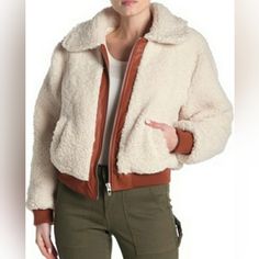 This Cute And Cozy Outerwear Staple Is Made Of Plush Faux Shearling Material That Is Always On-Trend. Fit: This Style Fits True To Size. - Spread Collar - Long Sleeves With Ribbed Cuffs - Front Zip Closure - 2 Front Slash Pockets - Faux Shearling Construction - Faux Leather Trim - Quilted Lining - Ribbed Hem. Faux Shearling: 100% Polyester Faux Leather: 60% Polyurethane, 40% Viscose Lining: 97% Polyester, 3% Spandex Black Fluffy Jacket, Long Teddy Coat, Cropped Faux Fur Coat, Nyc Shirt, Faux Fur Hooded Jacket, Faux Fur Cropped Jacket, Faux Shearling Jacket, Orange Jacket, Hoodie Coat