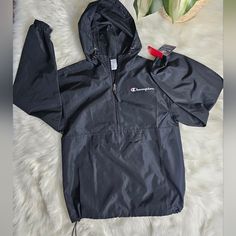 New With Tag. Size Small. Huge Front Zippered Pocket. 100% Polyester. Black Windbreaker With Drawstring Hood For Hiking, Black Half-zip Windbreaker For Outdoor Activities, Black Hiking Windbreaker With Drawstring Hood, Black Half-zip Windbreaker For Winter, Black Half-zip Winter Windbreaker, Black Half-zip Outerwear For Hiking, Black Half-zip Hiking Outerwear, Sporty Half-zip Windbreaker With Adjustable Hood, Black Half-zip Urban Windbreaker