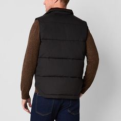 Layer up in style for cold-weather outings with this St. John's Bay men's quilted cargo puffer vest. Made from a warm material and lining, this midweight style has two front snap pockets and a full zip closure. Wear it over a sweater with jeans.Closure Type: ZipperPockets: 2 Front Snap PocketsWarmth Factor: MidweightApparel Length: 27 InchesOuterwear Length: ShortFiber Content: 100% PolyesterFabric Description: WovenFilling Content: 100% PolyesterLining: LinedLining Material: PolyesterCare: Mac… Sleeveless Black Down Outerwear, Black Utility Vest For Winter, Black Quilted Outdoor Vest, Black Cotton Puffer Jacket With Pockets, Black Vest For Outdoor Work In Winter, Quilted Vest For Cold Weather, Black Winter Vest For Outdoor Work, Winter Outdoor Work Vest Outerwear, Winter Vest For Outdoor Work