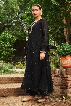 Black anarkali featuring scattered mirror work all over with kasap, pearl, pita, cutwork embroidery on the neckline and sleeve hem. Paired with a pant and a gota lace, tassel detailed dupatta. - Aza Fashions Lace Tassel, Black Anarkali, Embroidered Anarkali, Cutwork Embroidery, Mirror Work, Pants Pattern, Cut Work, Set For Women, Pita