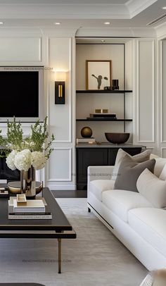 a living room filled with furniture and a flat screen tv mounted on the wall above a fireplace