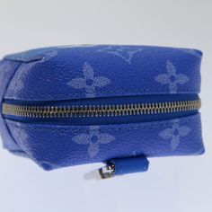 Brand: Louis Vuitton Model: Color: Blue Material: Canvas Inclusions: Dust Bag / Item Box Dimensions: W8cm x H8cm x D5cm Serial number: CX0250 Country of origin: France Condition: AB - good condition. Introducing the Louis Vuitton Monogram Blue Pouch, a fusion of classic elegance and contemporary flair. Crafted in the iconic LV monogram canvas with a refreshing blue hue, this pouch offers a luxurious accessory for any occasion. Elevate your ensemble with this statement piece, showcasing Louis Vui Designer Blue Rectangular Case Bag, Luxury Blue Travel Pouch, Modern Blue Rectangular Case Bag, Luxury Blue Rectangular Case Shoulder Bag, Luxury Blue Rectangular Shoulder Bag, Modern Blue Compact Bag, Luxury Blue Shoulder Bag With Zipper, Luxury Blue Shoulder Bag For Gift, Blue Shoulder Bag With Zipper Pouch As Gift