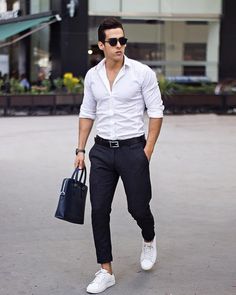 Best White Shirt Outfit Ideas For Men. White shirt, dress pants, bag, white sneaker, leather belt 1. Click image to view more. #men #outfits #UrbanMenOutfits #menfashion #mensguides #menswear #menstreetstyle #gentlemenstyle #summerfashion #stylish #summer #fashion #ootd #whiteshirt #shirts White Shirt Dress Outfit, Best White Shirt, Homecoming Outfits For Guys, Mens White Dress Shirt, Black Pants Outfit, Der Gentleman, White Shirt Outfits, Shirt Dress Outfit