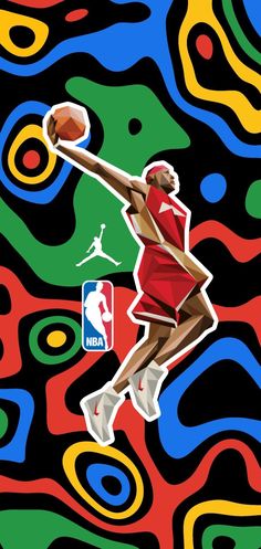 the basketball player is jumping to dunk the ball in the air with his hand