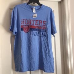 Nwt. Hooters Men’s T-Shirt. Pet Free And Smoke Free Home! Casual Blue Shirt For Fan Gear, Blue Fan Gear Tops With Text Print, Football Music, Music City Nashville, Colorful Shirts, Color Blue, Tee Shirts, Mens Shirts, Blue Color