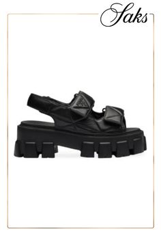 These flatform sandals with a modern menswear-inspired silhouette are enhanced by the quilted detail that echoes the iconic shape of the Prada triangle. The sporty style made of nappa leather is enriched by the distinctive monolith sole that combines important volumes with light rubber, becoming an expression of Prada's dual soul. Upper with padding and stitching Rubber sole, height: 55 mm (2.16'') Lug tread Imported Prada Triangle, Flatform Sandals, Menswear Inspired, Sporty Style, Nappa Leather, Leather Sandals, Prada, Sandals, Leather