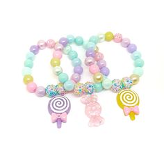 These adorable bracelets are the perfect favor for your little one's macaroon themed party! Each bracelet features a pastel resin macaroon charm, resin rhinestone beads and an assortment of pastel 10mm acrylic beads strung with durable stretch floss cord. You will receive a mix of charm colors. Each bracelet will arrive individually packaged in organza bags. Please select the number of bracelets and bracelet size needed from the drop down menu. Please message me if you have any questions. These Kawaii Pink Bracelet For Party, Pink Beaded Jewelry For Party Favors, Whimsical Pink Charm Bracelet For Birthday, Playful Pink Charm Bracelet For Birthday, Pink Round Beads Bracelets For Party Favors, Pink Bracelets With Round Beads For Party Favors, Whimsical Pink Bracelets For Birthday, Adjustable Cute Charm Bracelet For Party, Cute Adjustable Charm Bracelet For Parties