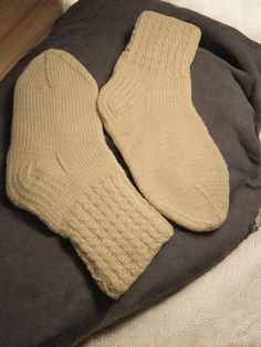 Keep your little one's feet toasty and comfortable this winter with our hand-knitted white socks. Made from a thoughtful blend of 30% wool and 70% acrylic, these socks combine the warmth of wool with the durability of acrylic, ensuring they can withstand playful days and peaceful nights alike. Key Features     Material Blend: Crafted with 30% wool for warmth and 70% acrylic for enhanced durability and ease of care.     Color: Classic white, perfect for matching with any outfit.     Size: Designe Winter Footwear, White Socks, Wool Knit, Kids Socks, White Sock, Casual Socks, Winter Shoes, Childrens Shoes, Socks And Hosiery