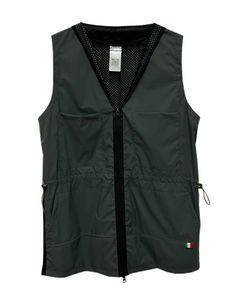 Introducing our unisex Drawstring Safari Vest, a stylish and functional addition to any wardrobe. This vest features a regular fit, front zip closure, and a back with mesh fabric for breathability. The shawl lapel and front patch pockets add a touch of utility, while the waist drawstrings allow for a customized fit. The sleeveless design and straight hem make it perfect for layering over a variety of outfits, and the construction of nylon 58% and PU 42% ensure durability and comfort. Made in Italy, this versatile vest is a must-have for any fashion-forward individual. Regular fitFront two-way zip closure Back with mesh fabricShawl lapelFront patch pockets Waist drawstringsSleevelessStraight hemNylon 58% PU 42% / PL 97% EL 3%Height: 80 cmMade in ItalyWomenS Bust: 84 - 89 cm, Waist: 66.5 - 6 Safari Vest, Utility Vest, Mesh Fabric, Patch Pocket, Must Haves, Shawl, Fashion Forward, Wardrobe, Fabric