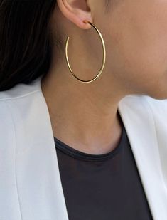 Meet the most PERFECT hoop earrings you'll ever own! A must-have investment piece, hoops are always youthful and in style - and make the perfect gift! Our team spent months PERFECT-ing the classic hoop design. We created everyday hoops that are the PERFECT size - not too big, not too small, are lightweight to ensure all day comfort, and made of quality materials so they can last forever. SUPER LIGHTWEIGHT: Each hoop weighs only 0.18 ounces - PERFECT for all day wear! Features a unique hollow tub Hoop Design, Mini Hoop Earrings, Vermeil Jewelry, Sterling Silver Hoops, Rose Gold Earrings, Silver Hoops, 18k Rose Gold, Gold Vermeil, Sterling Silver Earrings