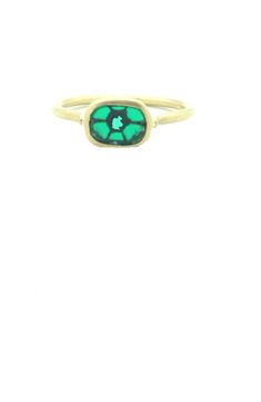 We love Monaka's stunning one-of-a-kind gemstone designs and this super rare Trapiche emerald is at the top of our list! Set in a 18kt yellow gold bezel setting with a glowing matte finish, this genuine emerald is so unique and all natural. The unconventional shape mixed with so much personality of this precious gemstone is sure to become someone's favorite piece. Trapiche Emerald: 0.54ctw Designer: Monaka, handmade in Tokyo. Unique Yellow Gold Oval Emerald Ring, Unique Oval Emerald Ring In Yellow Gold, Unique 14k Gold Emerald Ring, Unique Green Emerald 14k Gold Ring, Unique 14k Gold Green Emerald Ring, Unique Green Emerald Ring In 14k Gold, Modern Yellow Gold Emerald Cabochon Ring, Yellow Gold Emerald Cabochon Ring Gift, Unique Gold Emerald Ring With Bezel Setting