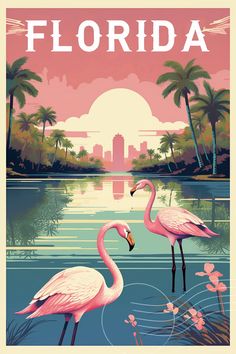 two pink flamingos are standing in the water near palm trees and flowers, while the sun is setting