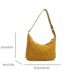 This bag features a geometric pattern and comes in a striking yellow color. Made from 100% polyester material, this medium-sized bucket bag is both stylish and durable. Bag Height - 8.3" Bag Length - 12.4"Bag Width - 3.5"Strap Length - 49.2" Trendy Yellow Shoulder Bag With Adjustable Strap, Yellow Square Shoulder Bag With Adjustable Strap, Rectangular Yellow Shoulder Bag With Zipper Closure, Yellow Rectangular Shoulder Bag With Zipper Closure, Yellow Bucket Shoulder Bag With Adjustable Strap, Trendy Yellow Hobo Bag With Adjustable Strap, Trendy Yellow Bucket Satchel, Trendy Yellow Hobo Bag For Daily Use, Casual Crossbody Bag