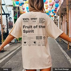 "Elevate your wardrobe with the unique Fruit of the Spirit shirt! Great as a gift to inspire love, joy, and peace in others. Get yours today and share the blessing!                                 ＊𝗡𝗢𝗧 𝗔𝗩𝗔𝗜𝗟𝗔𝗕𝗟𝗘 𝗜𝗡 𝗦𝗧𝗢𝗥𝗘𝗦＊ 👚 GET TO KNOW YOUR FRUIT OF THE SPIRIT SHIRT This Fruit Of The Spirit Shirt is printed on a Comfort Colors® 1717 Unisex Garment-Dyed Heavyweight T-Shirt with ink using a direct-to-garment printer by our production partner. They will print your item and send it right to your door! ✽ 100% Ring-Spun Cotton ✽ Medium fabric (6.1 oz/sq yd) ✽ Pre-shrunk ✽ Soft-washed ✽ Garment-Dyed Fabric ✽ Unisex Sizing ✽ Runs true to size ✽ Relaxed Fit ℹ️ Pigment dye refers to washed down colors that continue to soften and age with washing. Pigments are insoluble color pa Fruit Of The Spirit Tshirt, Fruit Of The Spirit Shirt, Church Shirt Designs, Fruit Shirt, Graphic Shirt Design, Blessed Shirt, Church Shirt, Spirit Shirts, Fruit Of The Spirit