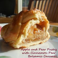 an apple and pear pastry on a plate with the words, apple and pear pastry with cinnamon pea balsamic caramel