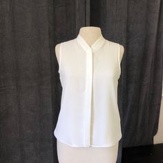 New With Tag Good Condition Offer Welcome Classic Sleeveless Blouse For Spring, Fitted White Calvin Klein Tops, Chic Calvin Klein Tops For Spring, Chic Calvin Klein Spring Tops, Elegant White Calvin Klein Tops, Classic White Sleeveless Blouse, Fitted Calvin Klein Spring Blouse, Fitted Calvin Klein Blouse For Spring, Fitted Calvin Klein Office Tops