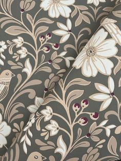 a close up view of a flowery wallpaper