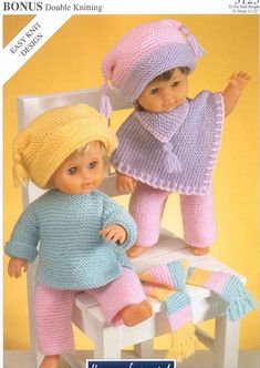 two dolls sitting next to each other on a chair