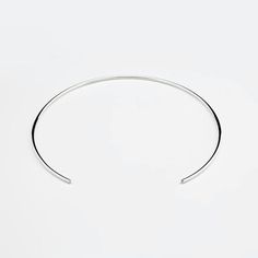 Handmade solid sterling silver choker necklace. Round, open design, polished finish. Perfect for stacking or as a minimalist statement.Diameter: 115 mmOpening width: 55 mmWire width: 2 mmVisit my shop: http://www.etsy.com/shop/jewelryMirta© MIRTA Minimalist Sterling Silver Chain Bracelet, Minimalist Sterling Silver Bracelet, Simple Silver Choker Jewelry, Minimalist Polished Sterling Silver Bracelet, Modern Sterling Silver Choker Necklace, Sterling Silver Choker In Silver, Silver Sterling Silver Choker, Modern White Gold Choker Necklace, Modern Sterling Silver Choker For Gift