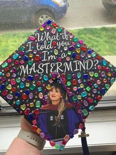 someone is holding up a graduation cap with the words what if i told you, i'm a masterpiece?