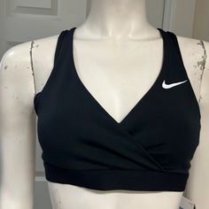 Great Sports Bra Top By Nike! In A Versatile And Festive Black In With Adjustable Back, This Medium-Support Bra Top Has Sporty Style. Deep Crisscross V-Neck Styling (With Lots Of Exposed Flesh) Shows Off Your Toned Shoulders And Back. Dri-Fit Technology Keeps You Cool, Dry, And Comfortable. Very Flattering! Size Medium (Armpit To Armpit: 13.75” Length: 11”) Available. New With Tags! Nike Sports Bra Aesthetic, Toned Shoulders, Sports Bra Top, Support Bra, Nike Sports Bra, Support Bras, Bra Top, Sporty Style, Bra Tops