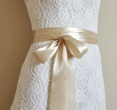 "Bridal satin ribbon This wedding belt will be a great addition to your gown. It will add some color to your wedding outfit and emphasize the waist.  It is 5 cm / 1,97\" wide and 3 m / 9,84 ft. / 3,28 yards long. This length is long enough to be worn tied in the back, and the tails will hang very long down the back of your gown after you tie your bow. It will also look beautiful if you wrap it around your waist twice and tie the bow in the front. If it is too long, you can easily shorter it (jus Elegant Ribbon Bridal Belt For Wedding, Elegant Ribbon Sashes As Gifts, Elegant Bridal Belt With Satin Bow For Wedding, Satin Sash With Bow For Bridesmaids, Elegant Bridal Belt With Satin Bow For Bridesmaid, Wedding Satin Tie Back Sash, Bridesmaid Sash With Satin Bow, Wedding Bridal Belt With Sashes In Satin, Bridesmaid Satin Sash With Satin Bow