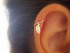 This listing is for one small 925 sterling silver hoop with tiny silver leaf charm. size : *22 gauge. *Diameter: 8 mm. For a different Pierce Ear, Bell Earrings, Helix Jewelry, Cartilage Earrings Hoop, Cartilage Hoop, Ear Clips, Bohol, Helix Piercing