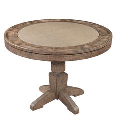 a round wooden table with an upholstered top