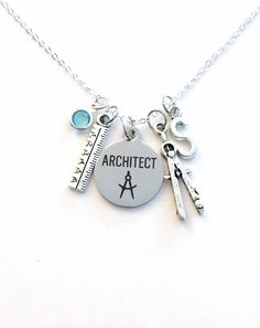 Gift for Architect Necklace, Architecture Jewelry, Compass and ruler charm, Retirement or Graduation Present  This necklace purchase includes: - a stainless steel laser engraved Architect charm: 3/4" x 7/8" approx - an antique silver compass and ruler charm - Swarovski crystal of your choice (see picture)  - initial charm of your choice - a 18" sterling silver plated link chain** (or you can choose length) - in an organza gift bag, ready to give as a gift ** PLEASE LEAVE ME A NOTE UPON PAYMENT I Hobby Lobby Gift Card, Architecture Jewelry, Compass Jewelry, Gift For Architect, Cheap Hobbies, Souvenir Jewelry, Graduation Present, Finding A Hobby, Hobbies For Women