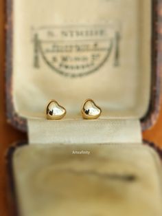 "Solid Heart Gold Studs, 9K Solid Gold Earrings, Real Gold Earrings, Spring and Summer Dainty Earrings, Elegant Earrings, Gift For Her -------DETAILS--------- - \"Single\" - refers to 1 individual earring     \"Pair\" - refers to 2 earrings - Measurement:0.5*0.5mm - length of earring post: 10mm - Material: 9K solid gold - Stamped with Au375(9K) hallmark  -  Free Beautifully wrapped & boxed -------PACKAGING------- We offer a free gift wrap option upon request. Just leave me a note at checkout saying that you would like your order gift wrapped. Each item is beautifully packaged in a letterbox friendly, hand stamped jewellery box made from 100% recycled card . -------MAINTENANCE------- Please store your accessories in a clean, dry environment. Avoid contact with cosmetics, perfumes, aerosols Classic Pierced Earrings For Valentine's Day, Classic Valentine's Day Earrings, Classic Gold Heart Earrings For Anniversary, Classic Gold Earrings For Valentine's Day, Classic Hallmarked Earrings For Valentine's Day, Classic Heart Earrings For Gift, Yellow Gold Heart Earrings For Wedding, Classic 14k Gold Heart Earrings, Classic Heart Cut Earrings As Gift