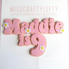 a birthday card with the word made in pink and daisies