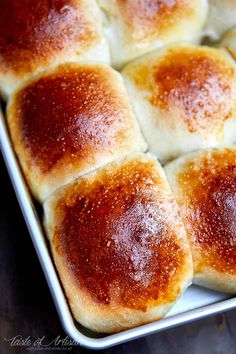 four pieces of bread sitting in a pan