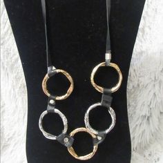 Five Hammered Rings Necklace Chic Statement Necklace Black Leather Cort, Hammered Ring In Gold And Silver Elegant Good For Any Occasions From A Day To Day To A Special Dinner. This Peace Will Take Any Outfit To Another Level The Necklace Comes Wrapped In A Beautiful Package. It Will Make The Perfect Gift For Your Loved Ones Or For Yourself. Please Note That The Colors May Vary Slightly Because Of Your Monitor Configuration. I Love Offers Bundle Discounts Available Same Day Shipping Elegant Round Necklaces With Metal Ring, Black Circular Metal Jewelry, Round Metal Necklaces With Metal Ring, Black Metal Circle Necklaces, Black Metal Circle Necklace, Black Circle Metal Necklaces, Black Circular Metal Necklace, Black Metal Circular Necklace, Disney Princess Necklace