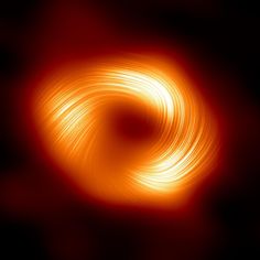 an orange swirl on a black background