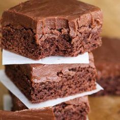 three chocolate brownies stacked on top of each other