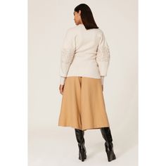 Off-white knit (64% Wool, 26% Polyamide, 9% Cashmere, 1% Elastane). Sweater. Mock neck. Long sleeves. Pull on. 24.5" from shoulder to hemline. Imported. White Knit Top With Ribbed Cuffs For Spring, White Feminine Sweater For Fall, Feminine Pointelle Knit Sweater For Fall, Neutral Spring Workwear Sweater, Winter White Sweater With Ribbed Cuffs For Spring, Chic Pointelle Knit Sweater For Work, Cream Pointelle Knit Outerwear For Fall, White Turtleneck Knit Top For Spring, Cream Pointelle Knit Top For Fall