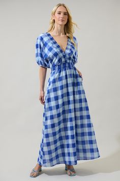 Have cheerful days when you wear this adorable midi dress! A plaid pattern throughout dazzles along a ruffle trim deep v-neckline with elastic at the border. Long bubble sleeves end with elastic cuffs. Easy to pair up with white heels and some silmple jewelry. - Lined- Pockets- Ruffles- Plaid- Color: Blue-multiSize + Fit - Model is 5'8" and wearing size XS- Measurements taken from size S - Waist: 13 1/2"- Length: 55" Fabric Self:50%Polyester 50%Cotton, Lining:97%Polyester 3%Spandex Style Number Bra Dress, V Neck Midi Dress, Tiered Midi Dress, White Heels, Body Dress, Long Sleeve Maxi, Curve Dresses, Blue Midi Dress, Active Wear Tops