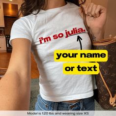 "Im So Julia Personalized" Graphic Slogan Printed On Aesthetic Retro Vintage 90s Y2k Baby Tee Shirt with our own unique font.  🎨 Available in White, Light Pink, Light Blue, Navy, Black. If you need a different color, please let us know! (Ash, Red, Sport Grey & Green)  🎁 Our baby tees are perfect gift for her or him offering timeless fashion and versatility that anyone will cherish. Baby tees, popular in the '90s, have short sleeves and a slightly cropped body, giving a flattering feminine shape. They originated in the skater/raver scene and were part of the era's child-like fashion trend. 🧵 Features : ‣ 90s baby tee style (for adults) ‣ 100% cotton ‣ Double-needle stitched neckline ‣ Seamless collar ‣ Classic fit ‣ True to size (see size chart) ‣ Y2K vintage streetwear fashion 📏 Sizing Vintage Aesthetic 90s, 90s Coquette, Baby Tee Shirt, Baby Tee Shirts, Aesthetic 90s, Streetwear Mode, Baby Tees Y2k, Y2k Baby Tee, Charli Xcx