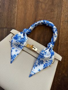 Add a beautiful, elegant touch to your handbag while also protecting your handles! This narrow, silky handbag scarf can be wrapped around the handle and tied in cute knots at either end or tied in a one-sided bow! This pattern features blue greyhounds and trees against a white background in a classic French Provincial Toile design.  Scarf Options (All 2" Width) "Mini" --  22" Length "Standard" -- 34" Length (this is the standard size for a designer boutique skinny scarf) "Extra Long" -- 46" Leng Large Scarf Tying, Scarf On Bag, French Scarf, Purse Scarf, Purse Handles, White French, Large Scarf, Hair Scarf, French Provincial