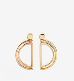 Modern Gold Plated Linear Earrings, Modern Yellow Gold Plug Earrings, Modern Brass Earrings With Polished Finish, Modern Gold-plated Linear Earrings, Modern Matte Gold Earrings, Gold Modernist Earrings, Modern Gold Hoop Plug Earrings, Modern Gold Hoop Linear Earrings, Modern Gold Linear Earrings For Pierced Ears