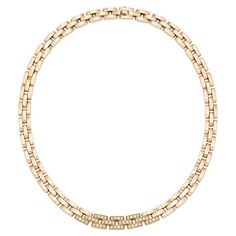 Iconic Cartier Maillon Panthere diamond necklace in 18 karat yellow gold. The necklace is meticulously crafted and consists of high-polish Maillon gold links with central section pave-set with approximately 1.4 carats of glittering fine white (F to G color / VVS clarity) round brilliant diamonds. The necklace offers versatile wear and will add a touch of sophisticated French style and sparkle to a casual or dressy occasion. Signed Cartier, numbered and with French hallmarks. In excellent conditi Luxury Cartier Necklace With Polished Finish, Luxury Cartier Fine Jewelry Necklaces, Luxury Timeless Cartier Necklace, Luxury Gold Necklace With Hallmark, Antique Cartier Yellow Gold Jewelry, Bamboo Necklace, Cartier Diamond, Cartier Necklace, Gold For Sale