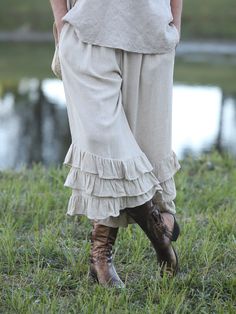 New Beige Linen Ruffle Bloomer PantalOOnie's from WhatWouldSusieWear! Lovely and somewhat Rustic Medium Weight Linen Bloomer pants with three layers of Ruffles. Come in Two Sizes. Petite to Medium and Large to XXL. Comfortable Elasticized Waist and of course they have pockets. So many ways to wear them. With our new Beige Crushed Velvet Frenchie Top, with a cropped Vintage Top or as I show here a Babydoll Dress! So versatile, fun and flirty! Please nite the elastic was cut a bit larger than usual, so a Petite- Medium is a bit bigger in the waist than usual, and Large Cut larger so will fit XXL. Pease check measurements to  assure your proper fit! The rest of the measurements are as they always have been.  PS! There really is a small difference in the elasticized waist, so if you would norm Fitted Beige Bottoms With Ruffle Hem, Beige Ruffled Bottoms For Spring, Beige Ruffled Bottoms For Fall, Chic Beige Bottoms With Ruffles, Fitted Bottoms With Ruffle Hem For Fall, Chic Full-length Ruffled Bottoms, Fitted Wide Leg Bottoms With Ruffle Hem, Spring Linen Bottoms With Ruffle Hem, Bohemian Beige Bottoms With Ruffles